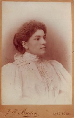 Johanna Fredricka Malherbe (1875-1959) as a young woman, in three-quarter profile, wearing a pale high-necked blouse...