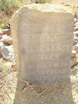 A hand-cut sandstone headstone in the Varsche Fontein cemetery, for an infant who lived about eight months. The...