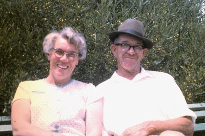 Hendrik Lodewyk Malherbe “Hennie” Oosthuizen (1909-1979) and his wife Anna Tobia Jeanne Joubert (1915-1974), sitting...