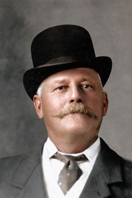 Frederik Simon Oosthuizen (1856-1936) in a bowler hat, a heavy moustache turned up at the ends, wing collar and...