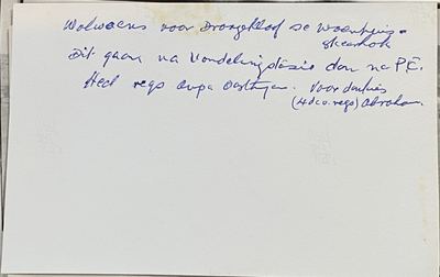 The back of the wool-wagon photograph, written across the top in blue ballpoint: "Wolwaens voor Droogekloof se...